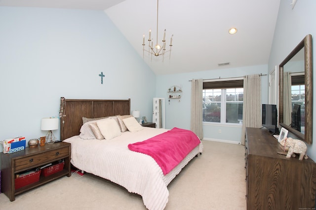 bedroom with a notable chandelier, light colored carpet, and high vaulted ceiling