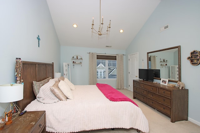 carpeted bedroom featuring a notable chandelier and high vaulted ceiling