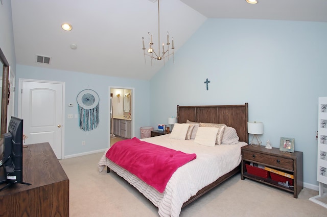 carpeted bedroom with high vaulted ceiling, connected bathroom, and an inviting chandelier