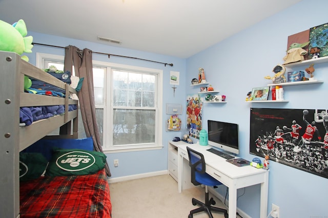 bedroom featuring light colored carpet