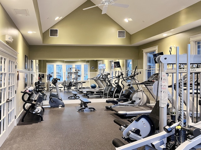 workout area with ceiling fan, high vaulted ceiling, and french doors