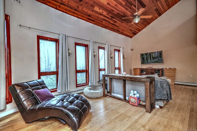 living room with a baseboard heating unit, high vaulted ceiling, wooden ceiling, and light wood-type flooring