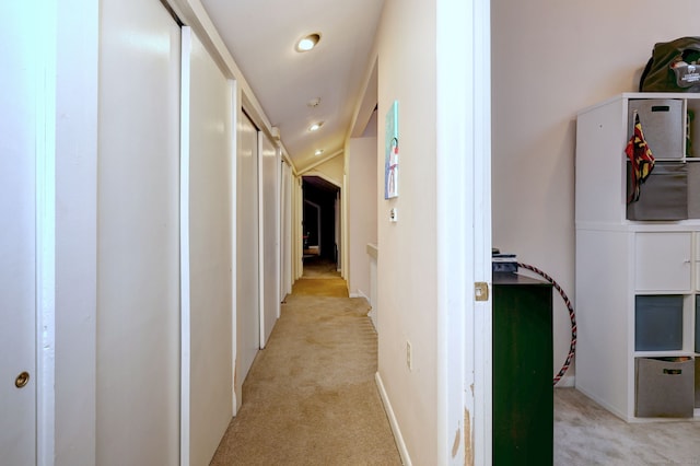 corridor with light carpet