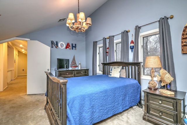 carpeted bedroom with high vaulted ceiling and a chandelier