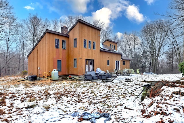 view of snow covered property