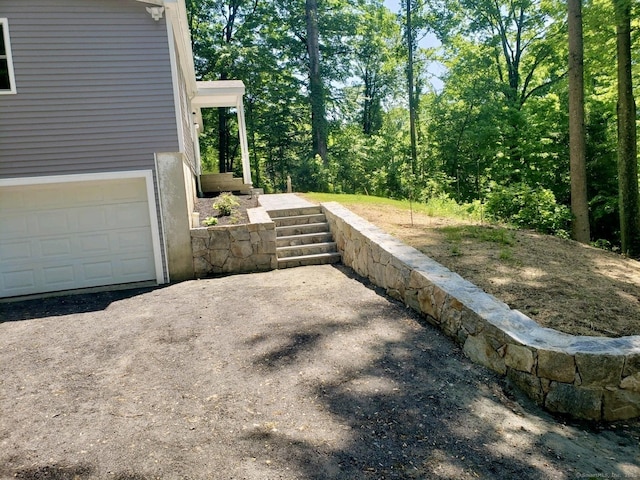 view of yard featuring a garage