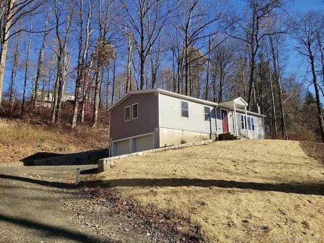 view of front of home with a garage