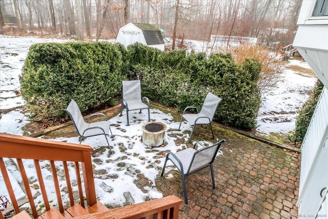 view of snow covered patio