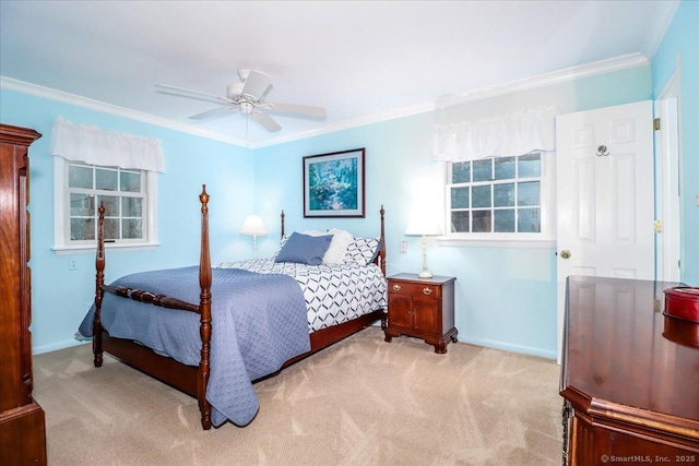 carpeted bedroom with crown molding and ceiling fan