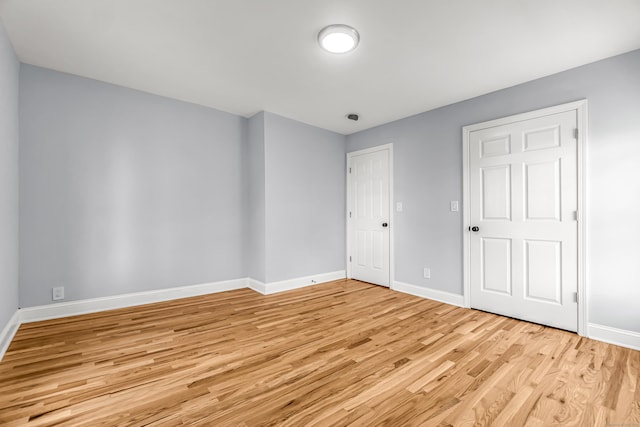 unfurnished bedroom with light hardwood / wood-style floors