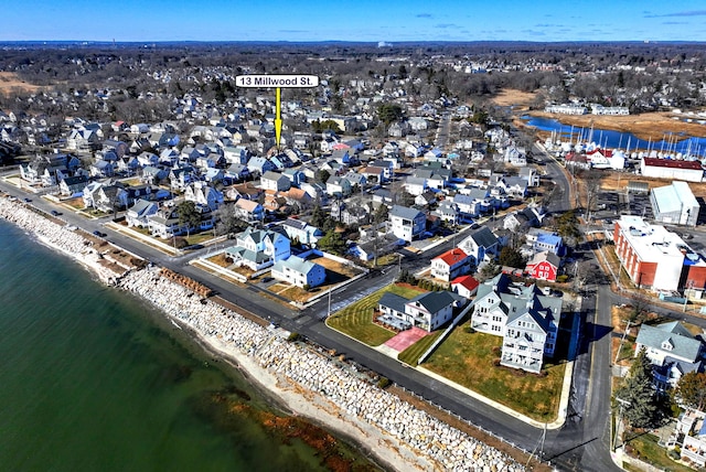 drone / aerial view with a water view