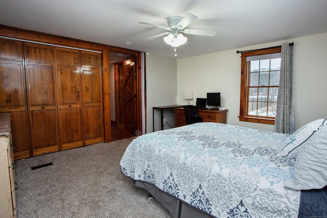 carpeted bedroom featuring ceiling fan