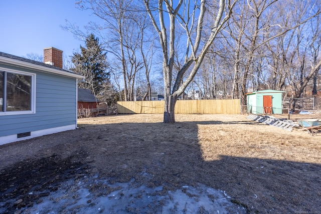 view of yard with a storage shed