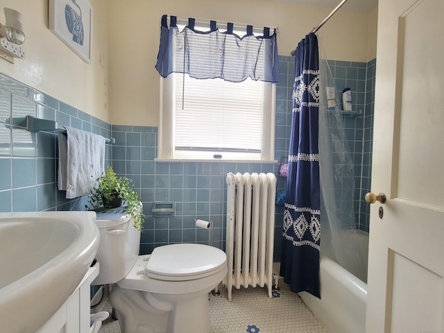 full bathroom featuring tile patterned floors, toilet, tile walls, radiator heating unit, and shower / bath combination with curtain