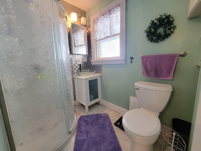 bathroom with vanity, toilet, and a shower with shower curtain