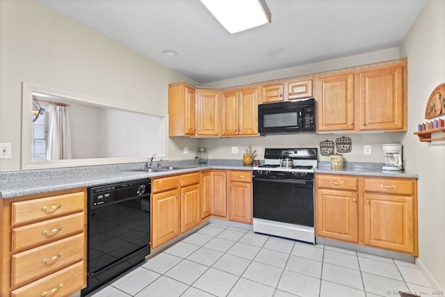 kitchen featuring sink, light tile patterned floors, and black appliances