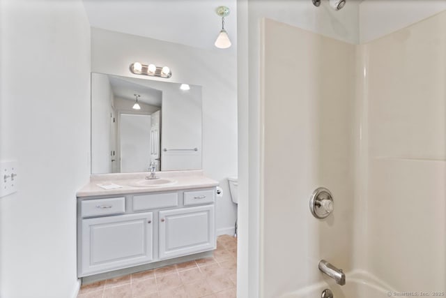 full bathroom with vanity, shower / tub combination, and toilet