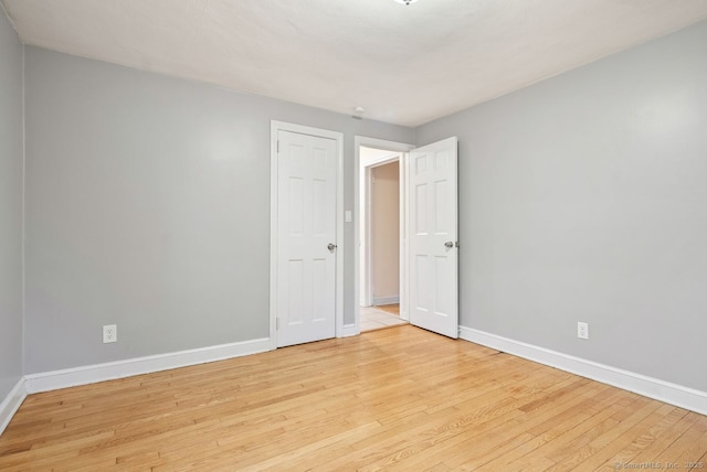 empty room featuring light hardwood / wood-style floors