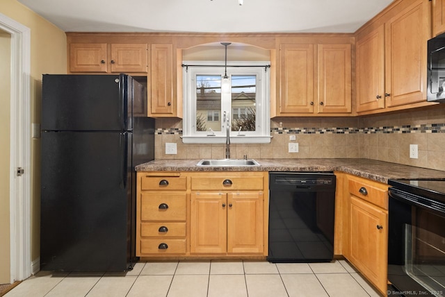 kitchen featuring sink, light tile patterned floors, decorative backsplash, and black appliances