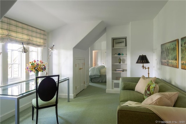 office area featuring light colored carpet