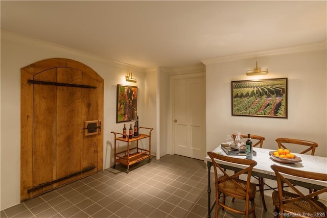 dining area with crown molding