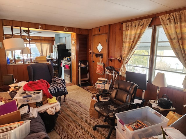 living room featuring wood walls