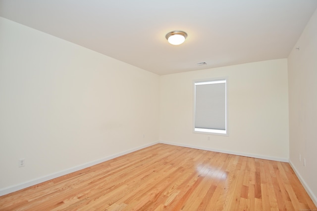 empty room featuring light hardwood / wood-style floors