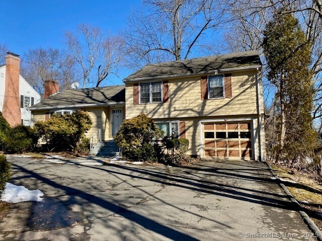 view of front of property featuring a garage