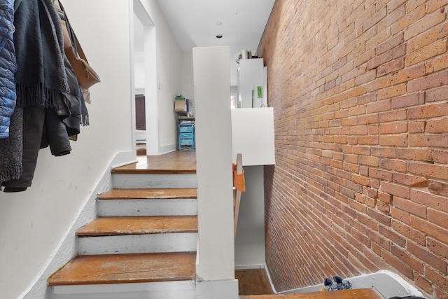 stairs with brick wall