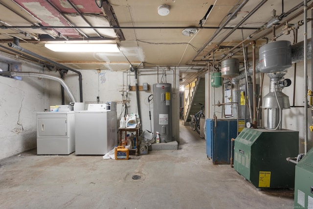 basement with washer and clothes dryer and water heater