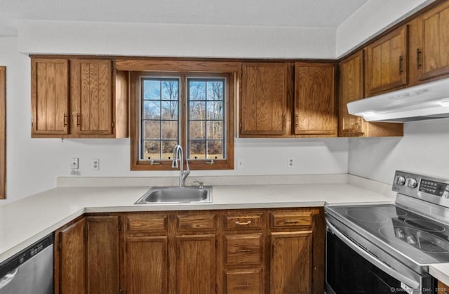 kitchen with appliances with stainless steel finishes and sink