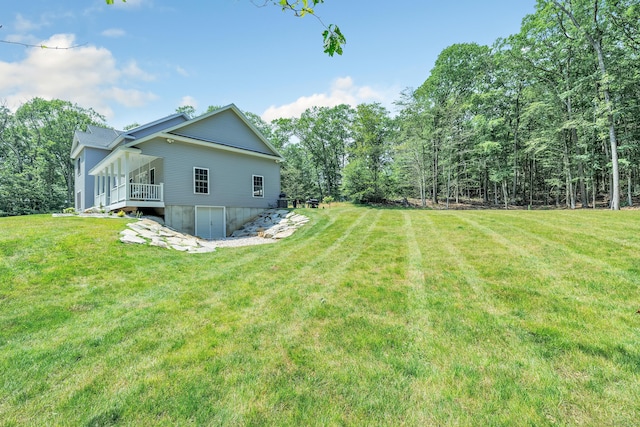 view of yard with a deck