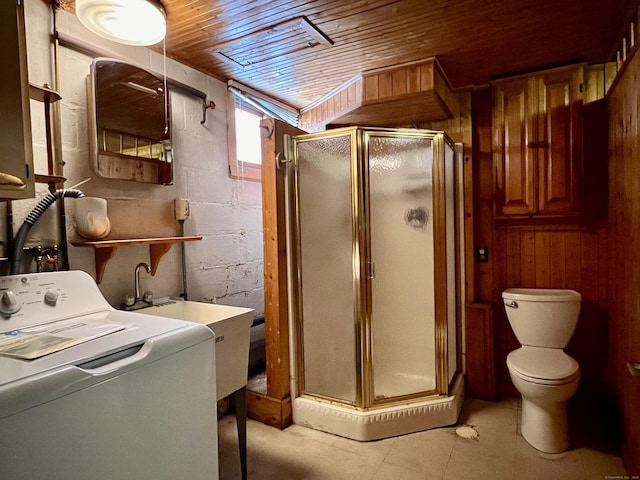 clothes washing area with washer / clothes dryer, wooden ceiling, and sink