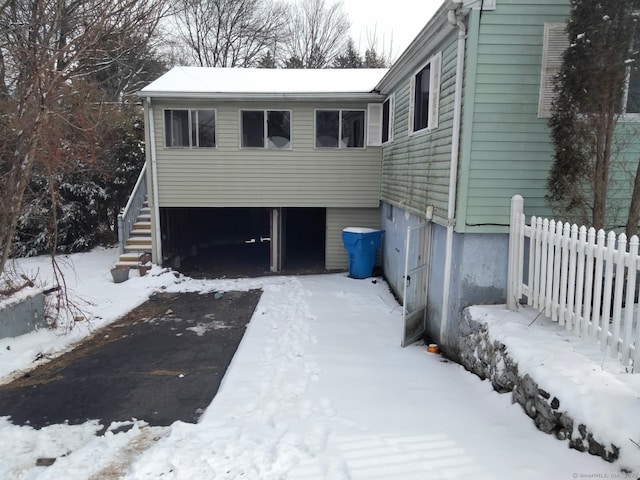 view of snow covered property