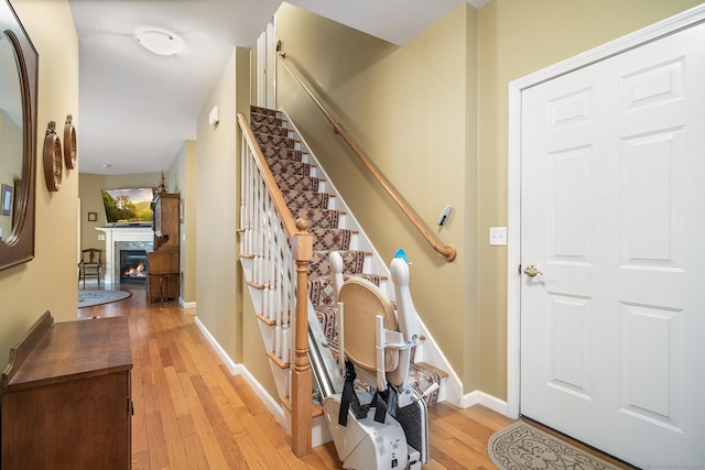 foyer entrance with light wood-type flooring