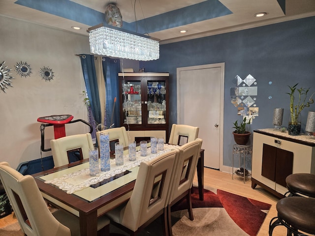 232 Hillside Ave, Waterbury, CT 06710 - dining area with wood finished floors, a chandelier, recessed lighting, a raised ceiling, and baseboards