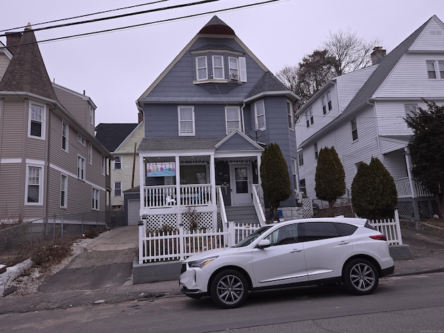 232 Hillside Ave, Waterbury, CT 06710 - victorian home with covered porch and a shingled roof