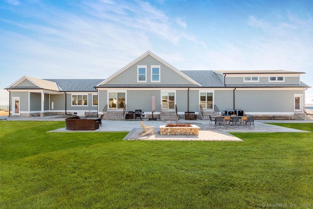 464 Park Blvd, Stratford, CT 06615 - rear view of house featuring a yard, a patio, entry steps, a standing seam roof, and a fire pit