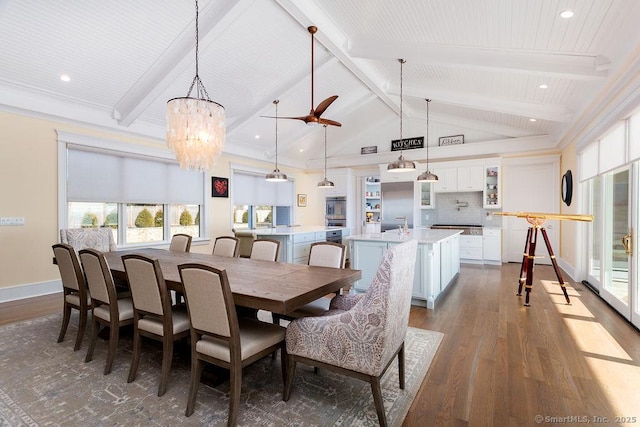 464 Park Blvd, Stratford, CT 06615 - dining room with lofted ceiling with beams, a chandelier, recessed lighting, dark wood-style flooring, and baseboards