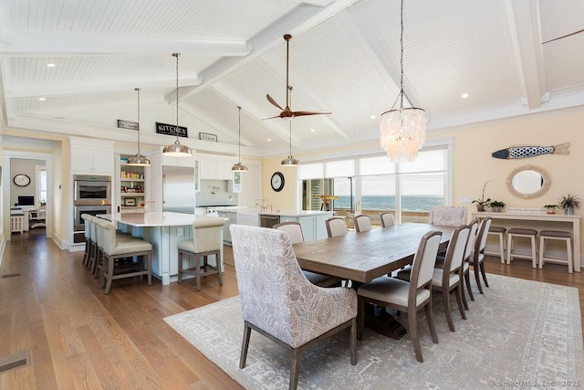 464 Park Blvd, Stratford, CT 06615 - dining room with visible vents, vaulted ceiling with beams, and wood finished floors