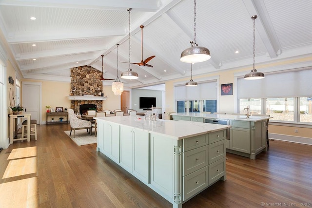 464 Park Blvd, Stratford, CT 06615 - kitchen with vaulted ceiling with beams, a fireplace, a large island, dark wood-type flooring, and open floor plan