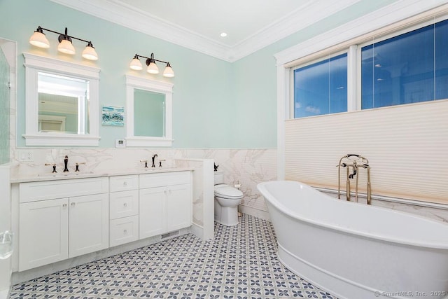 464 Park Blvd, Stratford, CT 06615 - full bathroom featuring ornamental molding, a sink, a freestanding bath, and double vanity