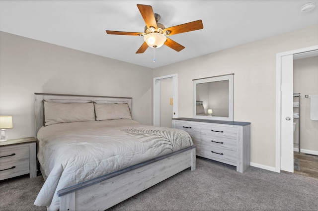 bedroom with ceiling fan and carpet