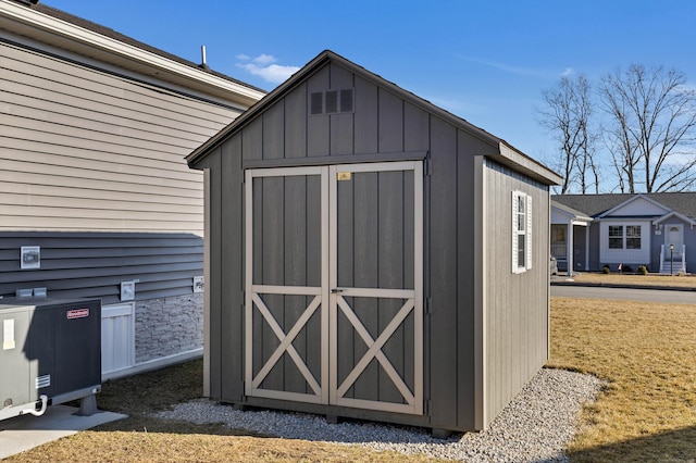 view of outdoor structure with central AC unit