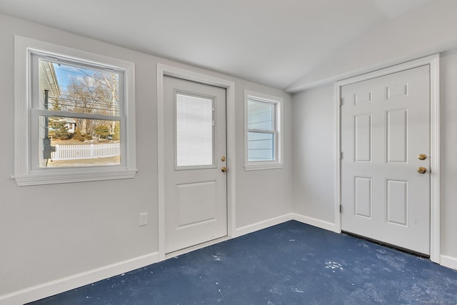 entryway with vaulted ceiling