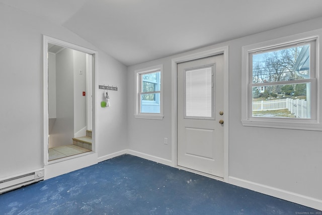 doorway with a baseboard radiator and vaulted ceiling