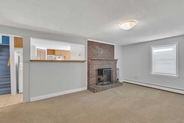 unfurnished living room featuring a fireplace, a textured ceiling, light carpet, and a baseboard heating unit