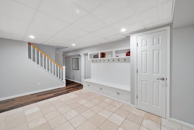 mudroom with a paneled ceiling