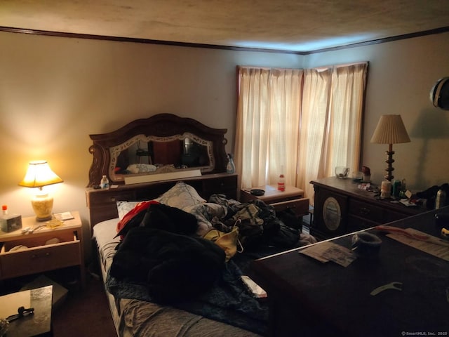 bedroom featuring ornamental molding