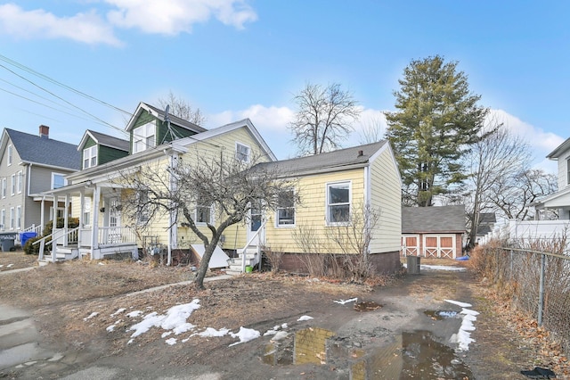 view of front of property featuring covered porch